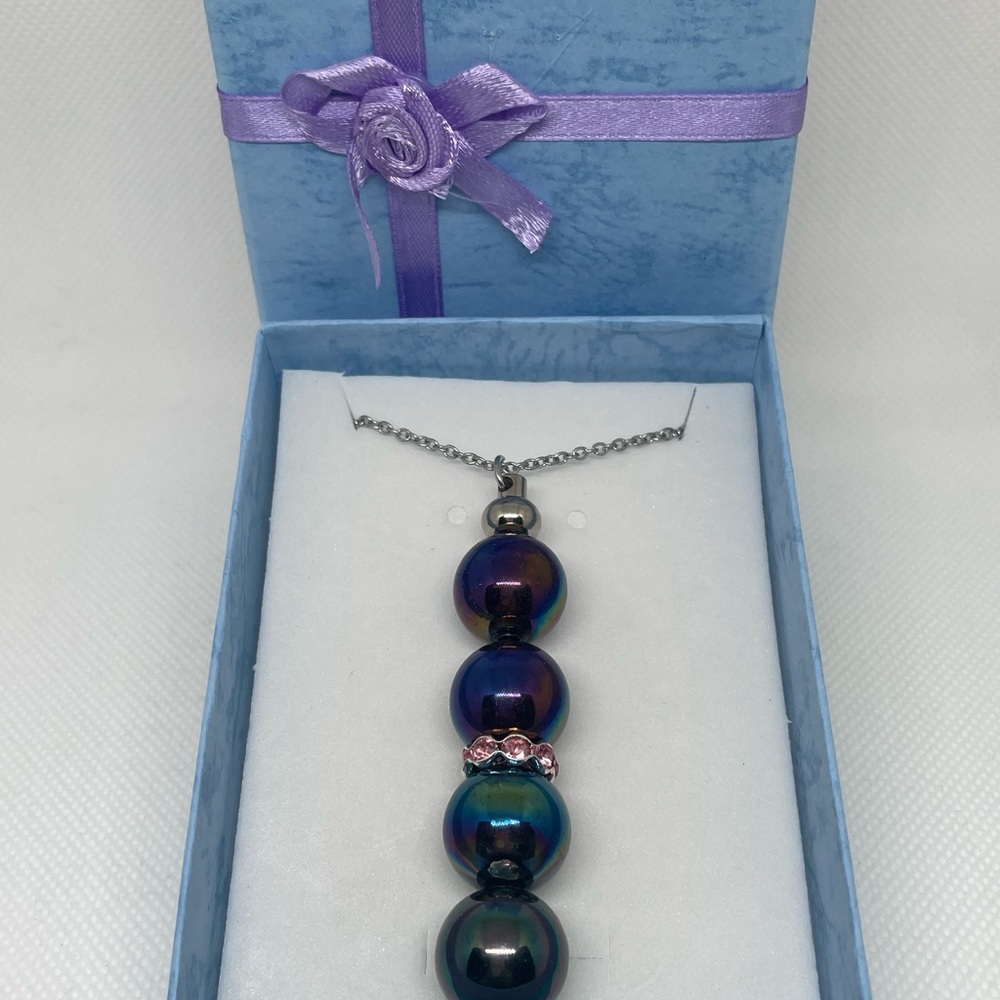 Exquisite Iridescent Necklace
Expertly Handcrafted, Exclusively Yours